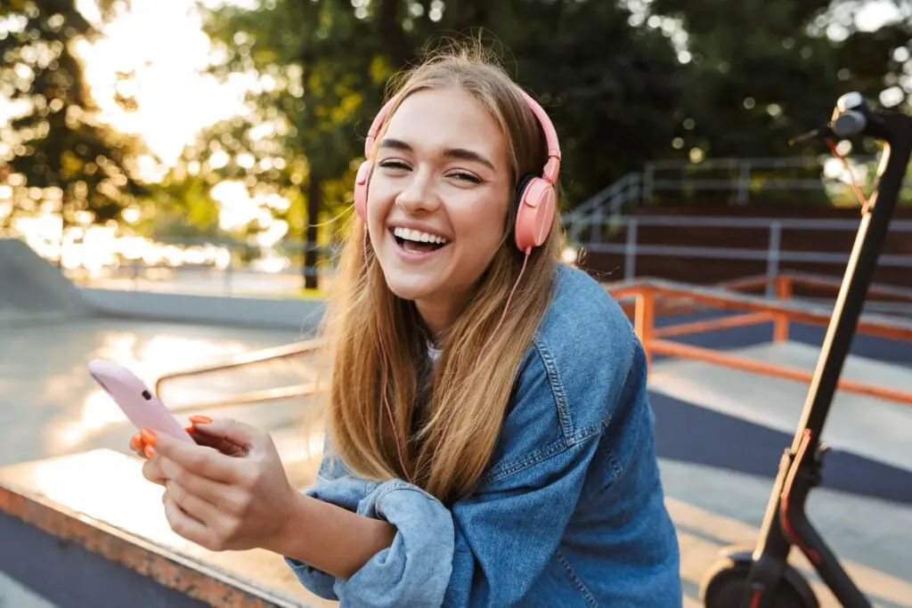 Teenage Girl Smiling With Invisalign In Mouth