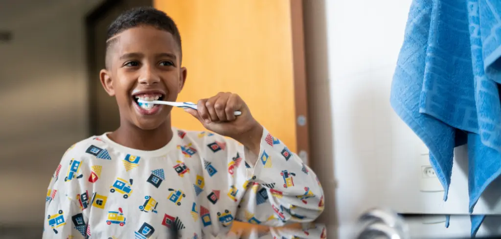 Teenager Brushing Teeth