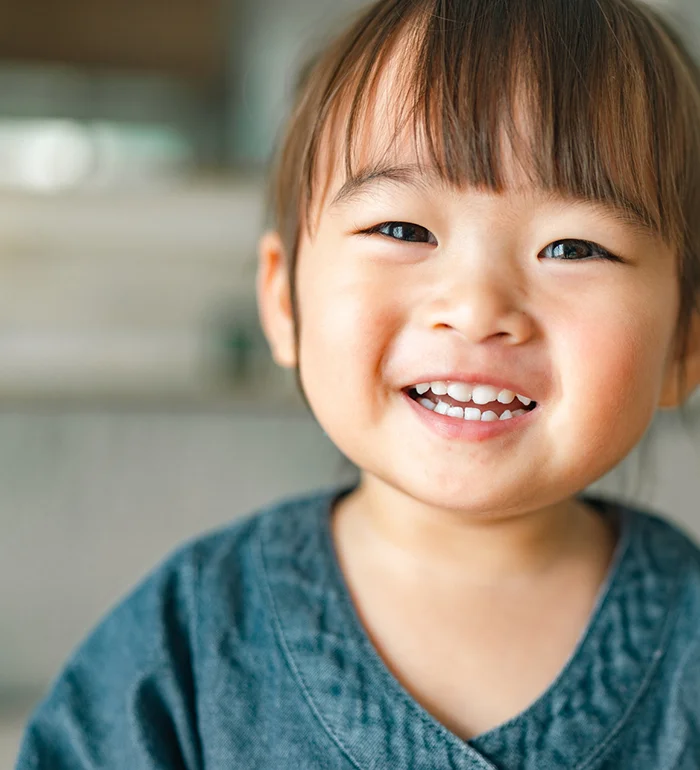 Toddler Smiling After Frenectomy Procedure